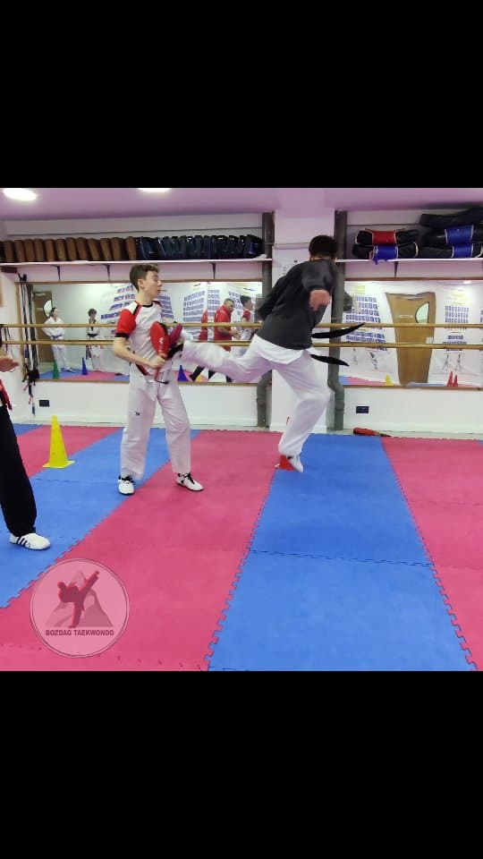Two youths sparring in the dojang